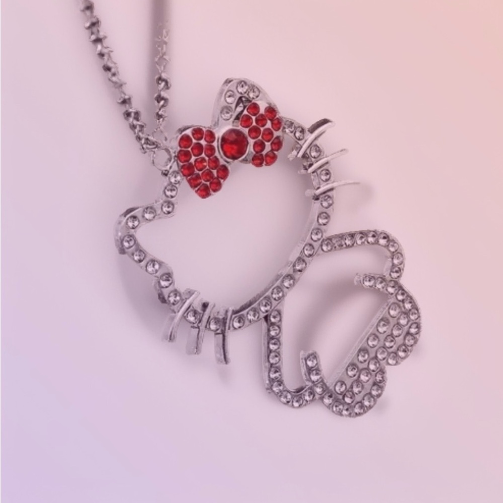Hello Kitty rhinestone crystals with a beautiful red bow. - Picture 2 of 6
